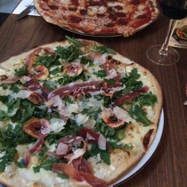 Prosciutto and fig with arugula and shaved parmesan